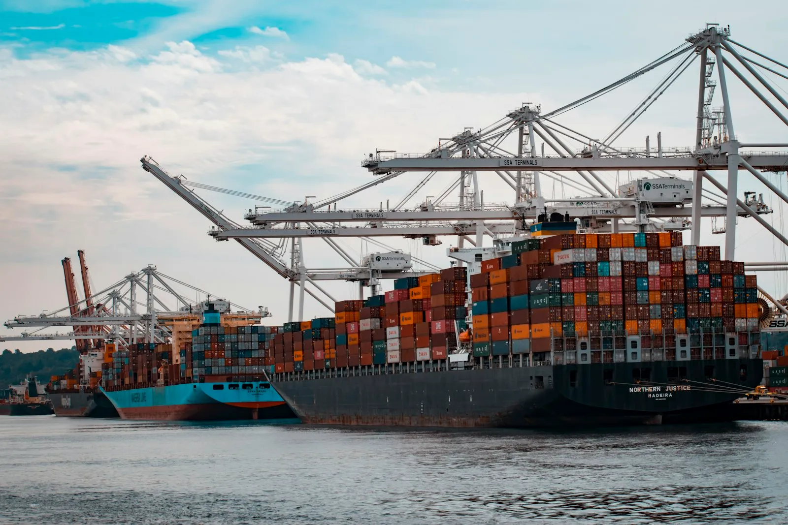 Cargo ships and containers at a busy port
